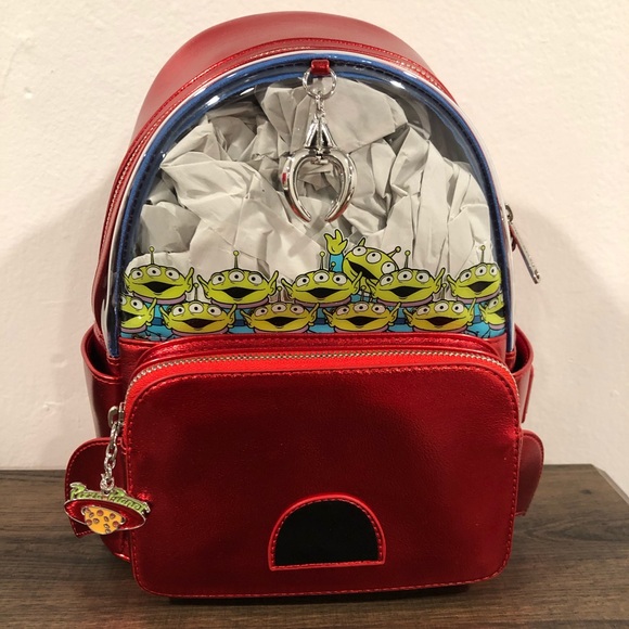 loungefly disney pixar toy story claw machine mini backpack
